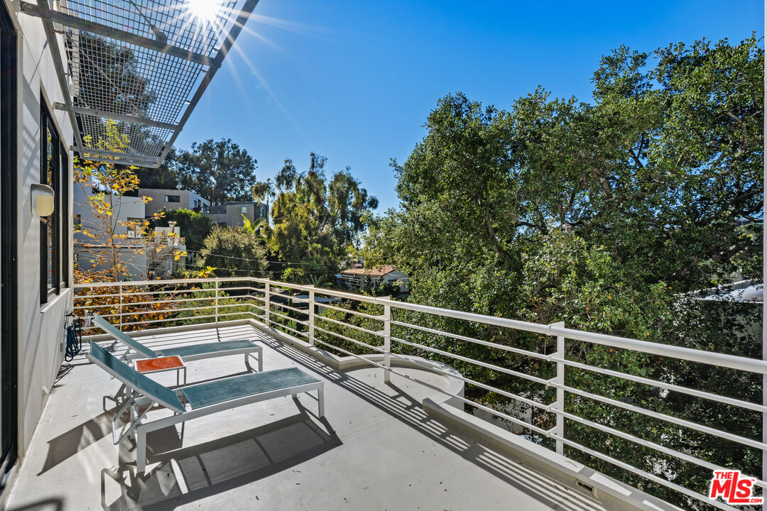 477 Upper Mesa Road Santa Monica, CA 90402 - Photo 22 of 30 a view of balcony with two chairs