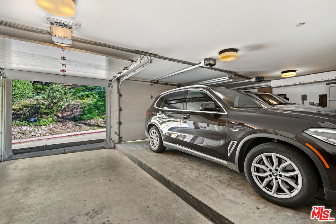 477 Upper Mesa Road Santa Monica, CA 90402 - Photo 30 of 30 a view of car parked in garage