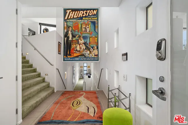 a bathroom with a sink and a shower curtain