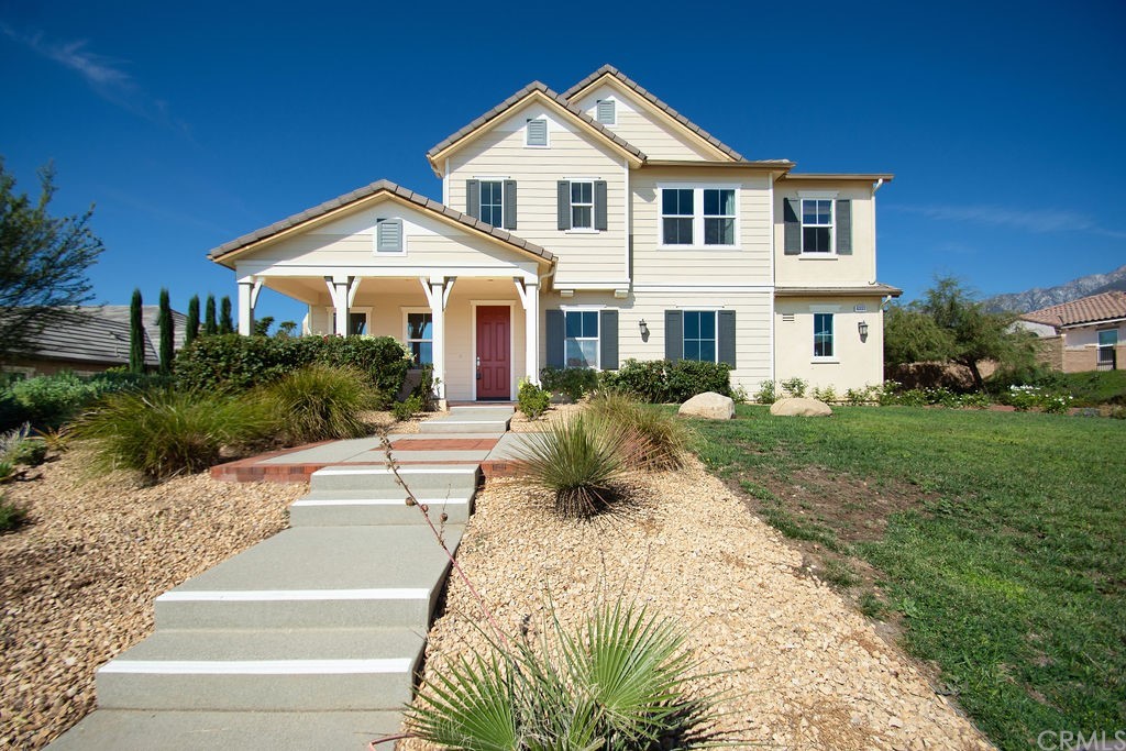 6332 Tribeca Court Rancho Cucamonga, CA 91739 - Photo 1 of 1 a front view of a house with a yard