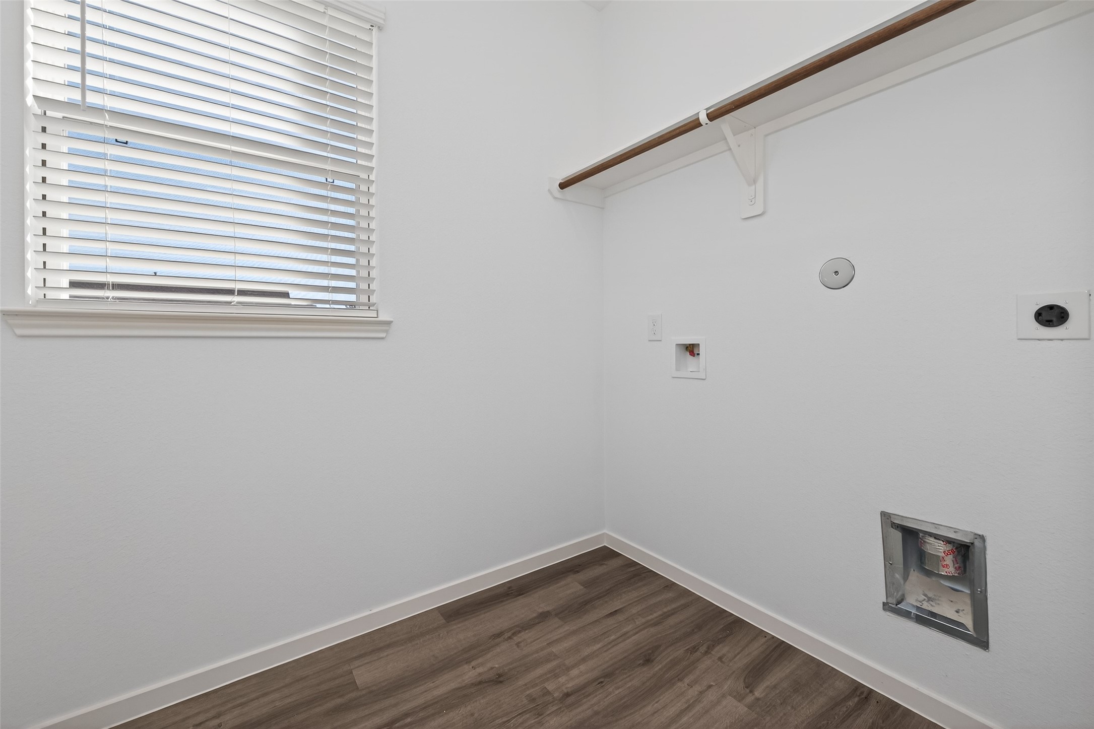 9734 Enclave Ridge Road Willis, TX 77318 - Photo 15 of 29 a view of a small space with wooden floor and windows