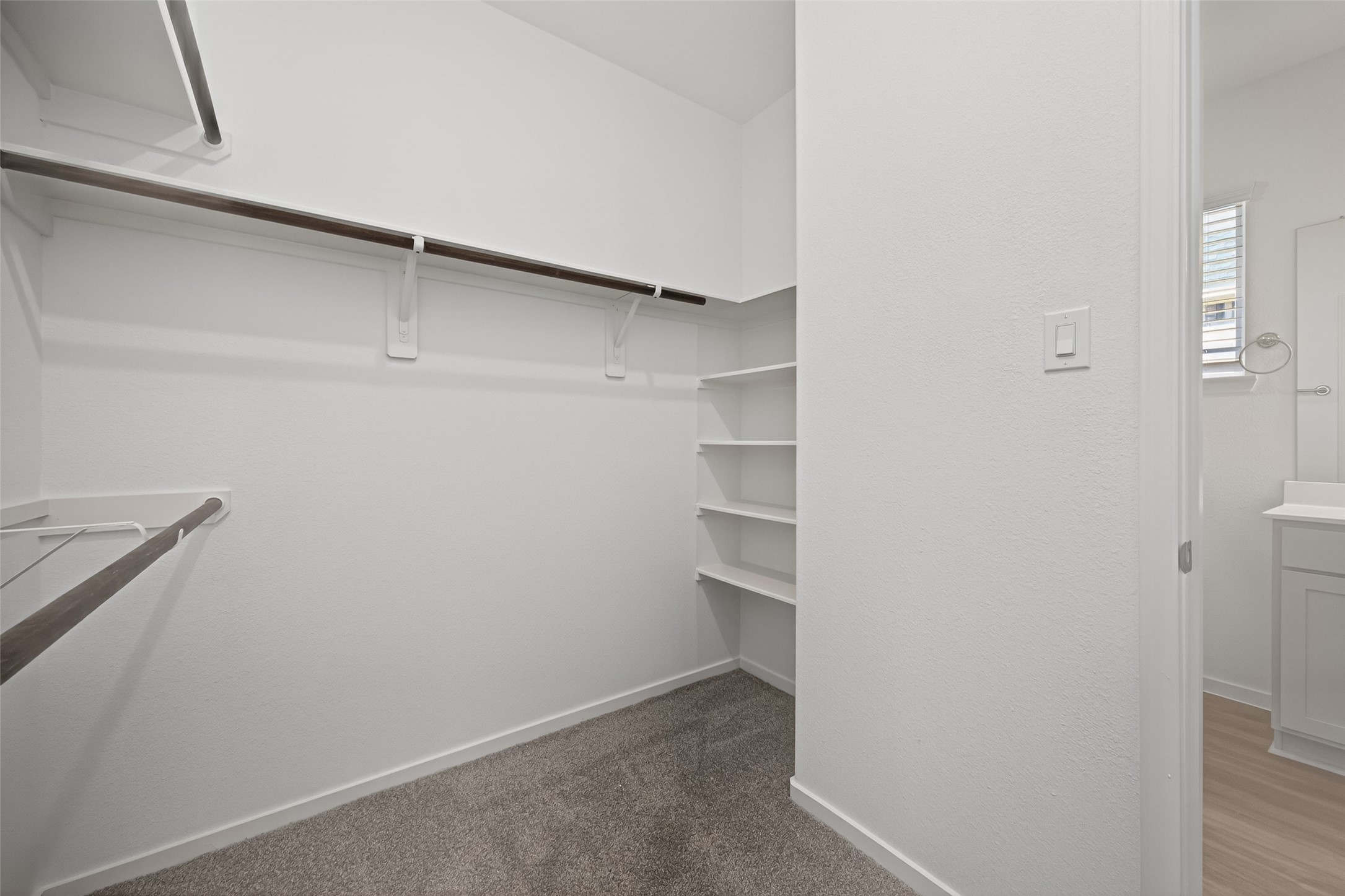 9734 Enclave Ridge Road Willis, TX 77318 - Photo 21 of 29 a view of a walk in closet