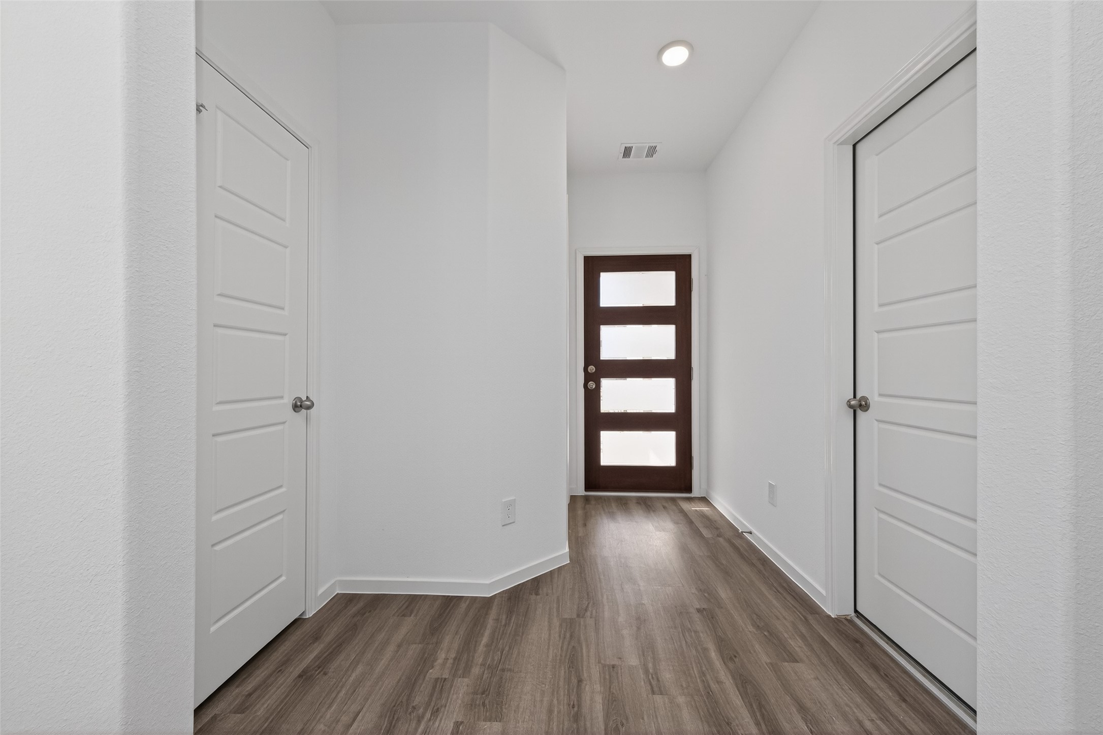 9734 Enclave Ridge Road Willis, TX 77318 - Photo 5 of 29 wooden floor in an empty room