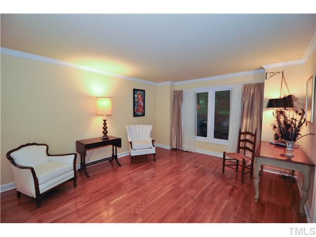 5409 Edington Lane Raleigh, NC 27604 - Photo 11 of 22 a living room with furniture and a wooden floor