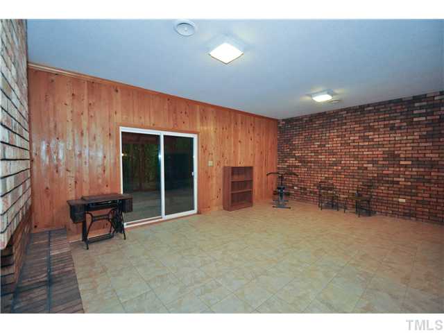 5409 Edington Lane Raleigh, NC 27604 - Photo 14 of 22 a view of an empty room with furniture and a window