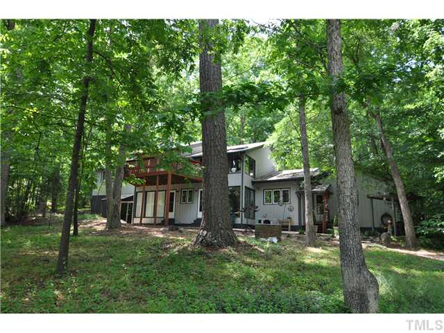 5409 Edington Lane Raleigh, NC 27604 - Photo 17 of 22 a view of a house with backyard and a tree