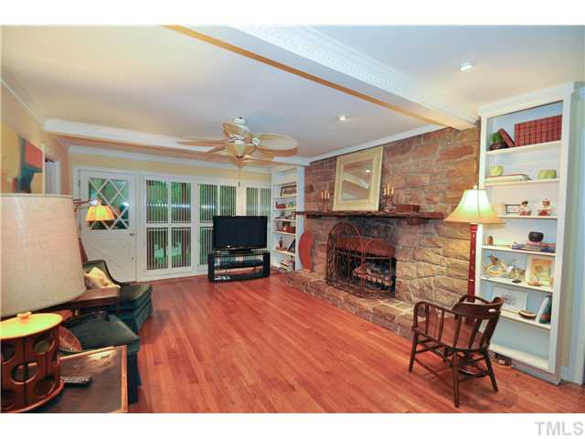 5409 Edington Lane Raleigh, NC 27604 - Photo 6 of 22 a living room with furniture and a fireplace