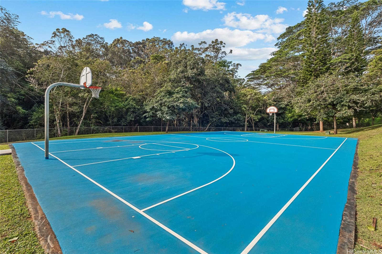 95-660 Wikao Street, Unit K304 Mililani, HI 96789 - Photo 24 of 24 a view of a tennis court