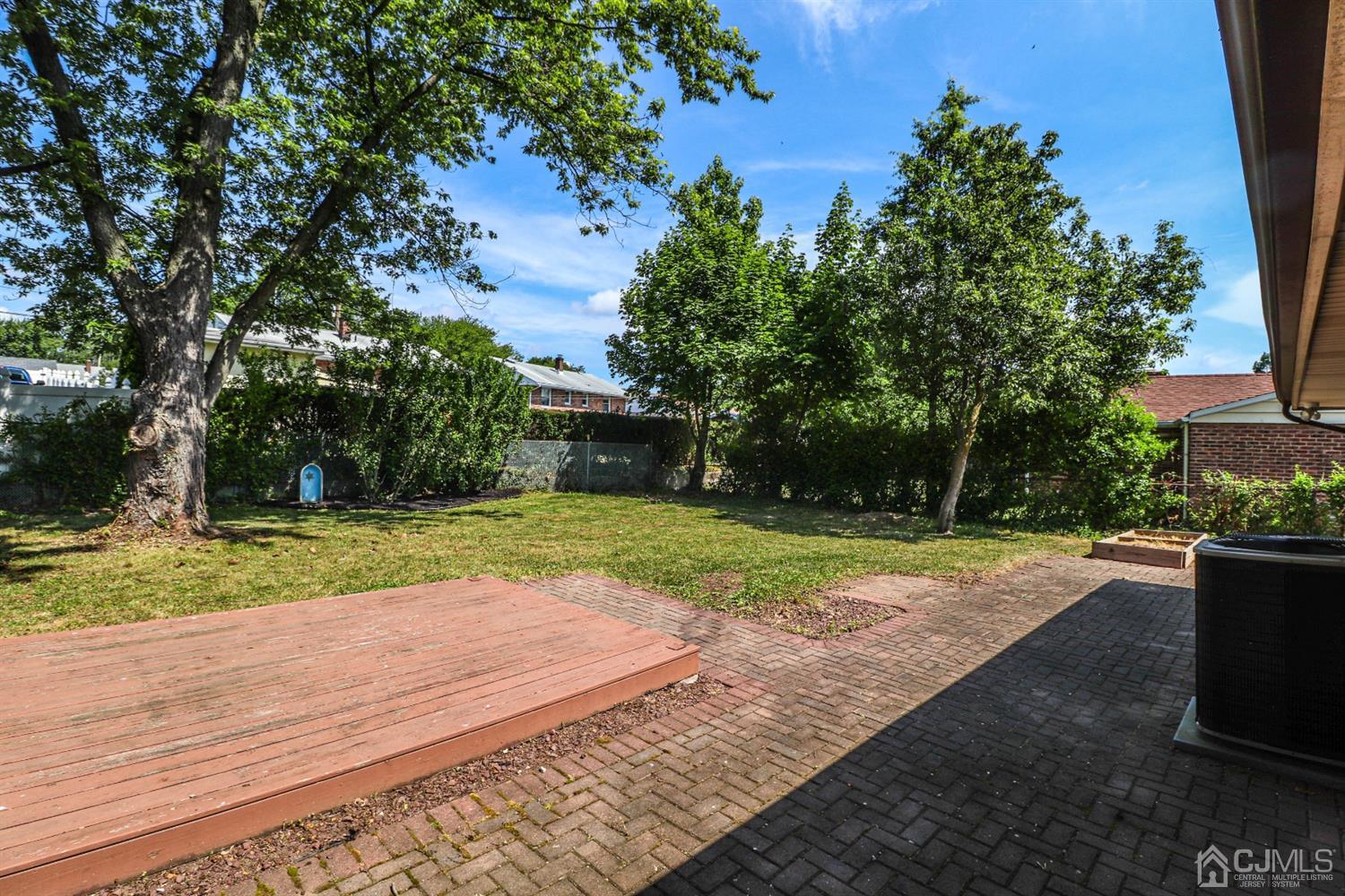 12 Roger Road Edison, NJ 08817 - Photo 22 of 31 a view of backyard with green space