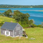 a view of a house with a ocean view