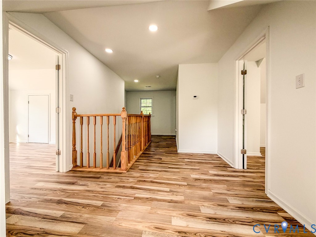 19614 Manson Church Road McKenney, VA 23872 - Photo 16 of 24 a view of a hallway with wooden floor and staircase