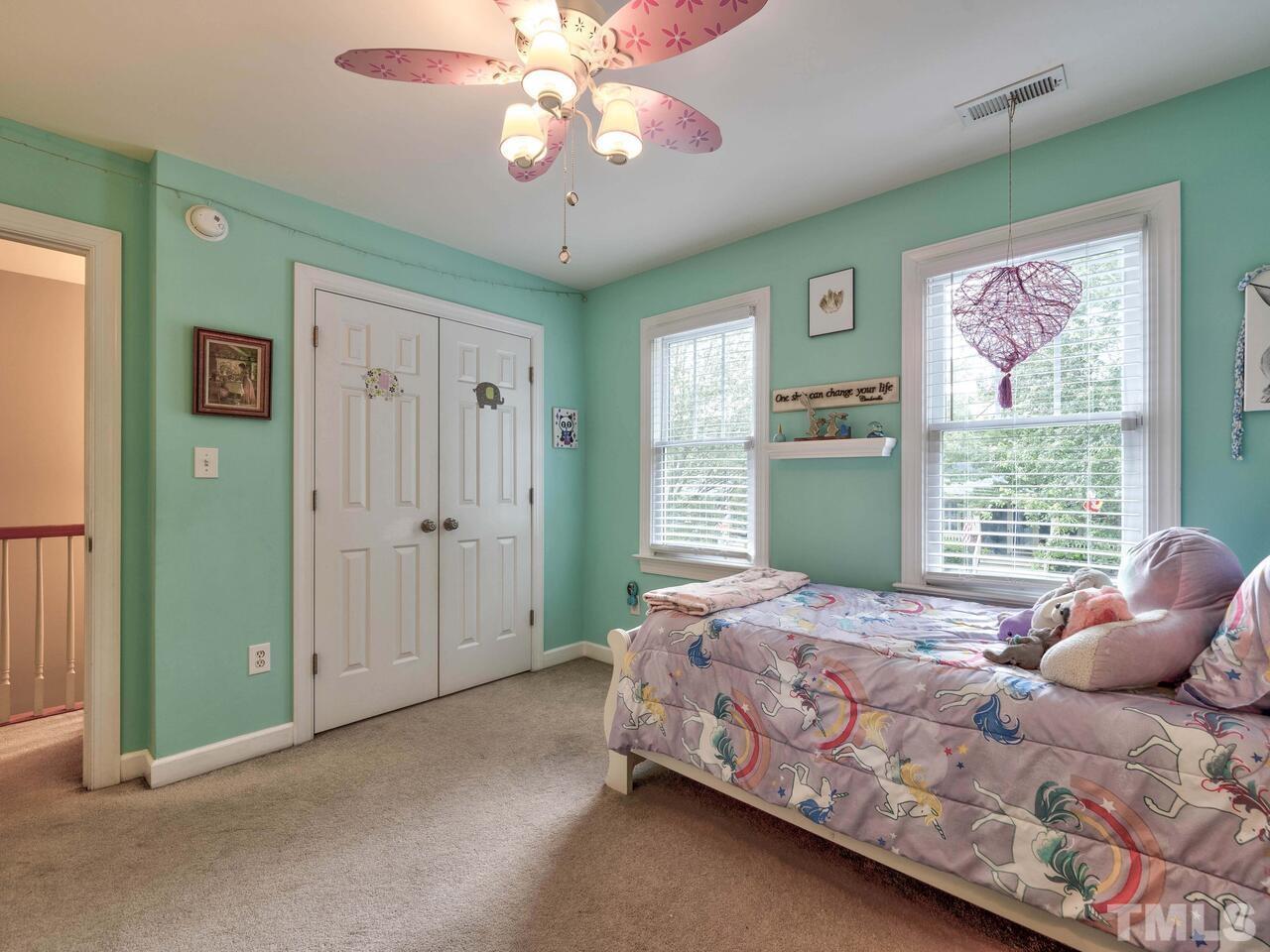 2228 Karns Place Raleigh, NC 27614 - Photo 34 of 62 a bedroom with a bed and a window