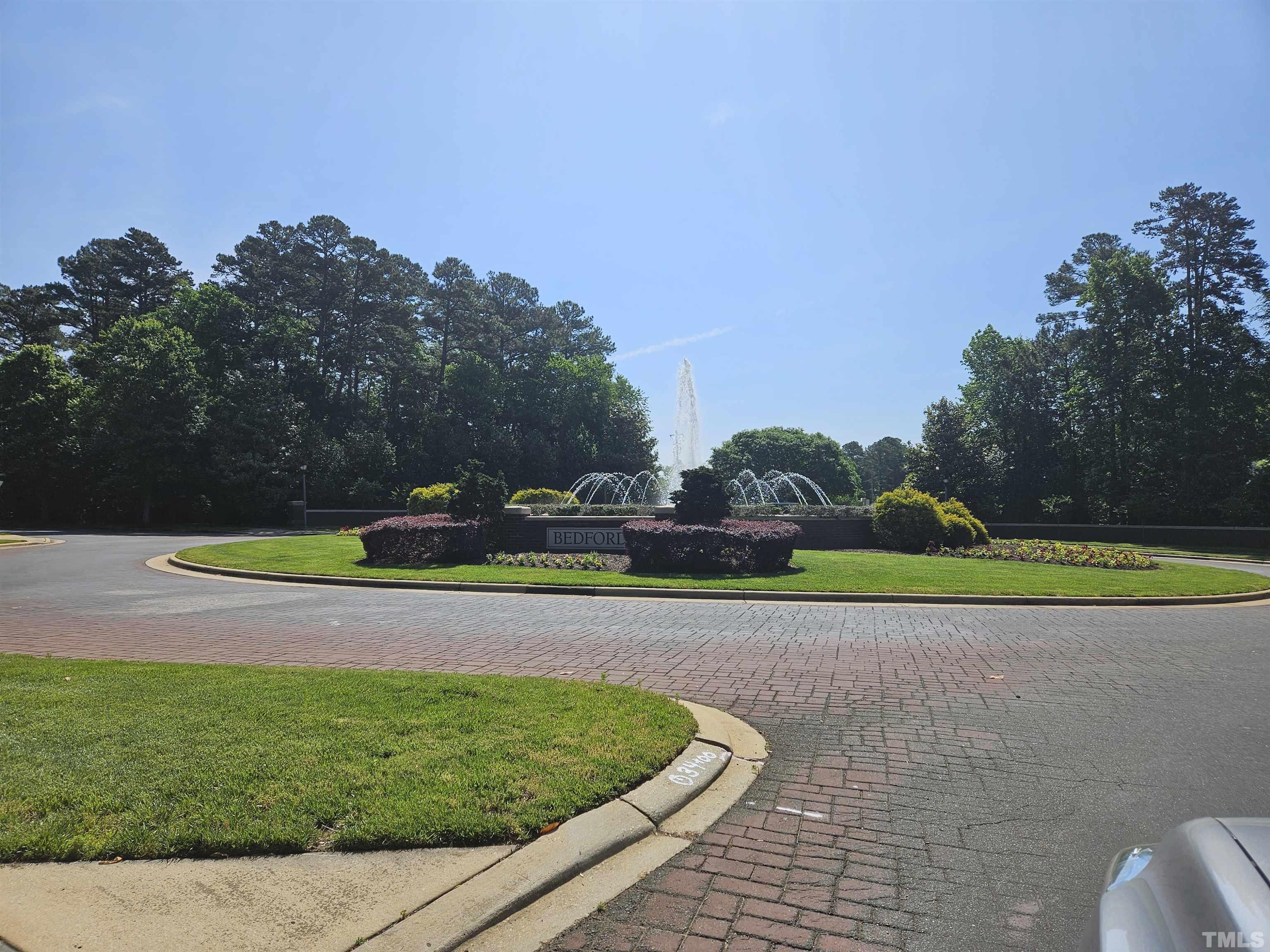 2228 Karns Place Raleigh, NC 27614 - Photo 56 of 62 a view of a golf course with a lake