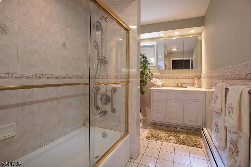 5 Marine Terrace Sparta, NJ 07871 - Photo 11 of 48 a bathroom with a shower and a sink