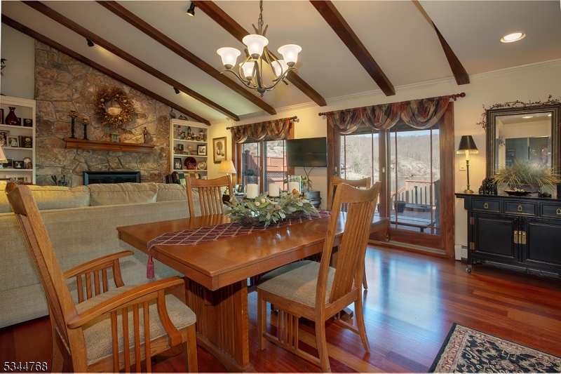 5 Marine Terrace Sparta, NJ 07871 - Photo 12 of 48 a view of a dining room with furniture wooden floor and chandelier
