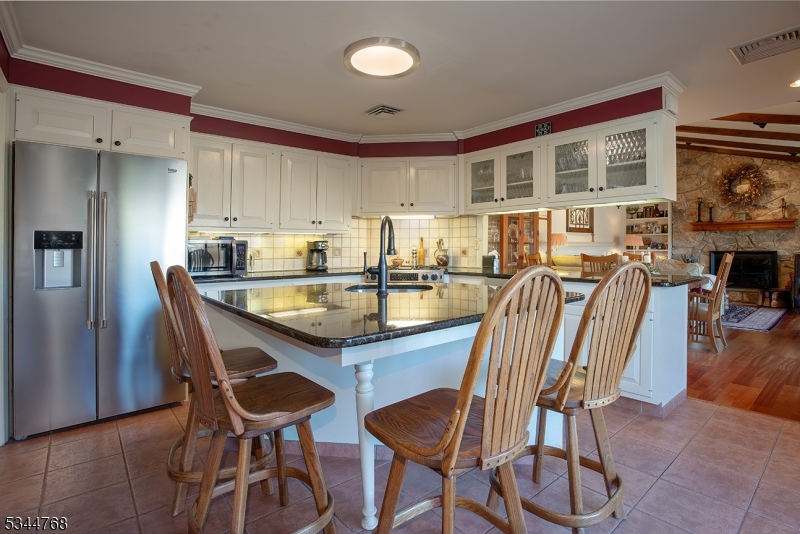 5 Marine Terrace Sparta, NJ 07871 - Photo 14 of 48 a dining room with furniture and window