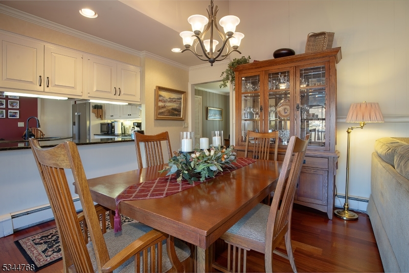 5 Marine Terrace Sparta, NJ 07871 - Photo 21 of 48 a view of a dining room with furniture window and wooden floor