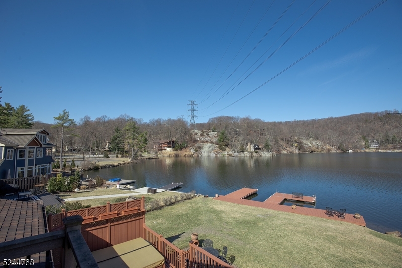 5 Marine Terrace Sparta, NJ 07871 - Photo 26 of 48 a view of a lake with couches chairs