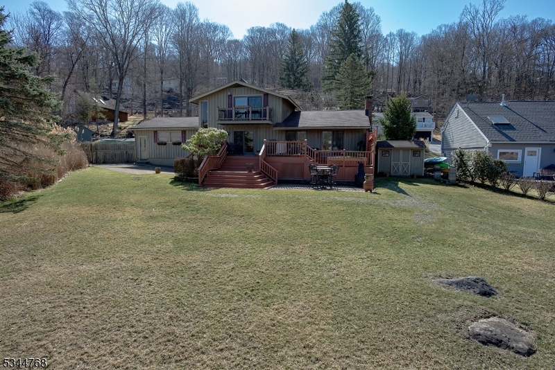 5 Marine Terrace Sparta, NJ 07871 - Photo 3 of 48 a view of a house with a yard and sitting area