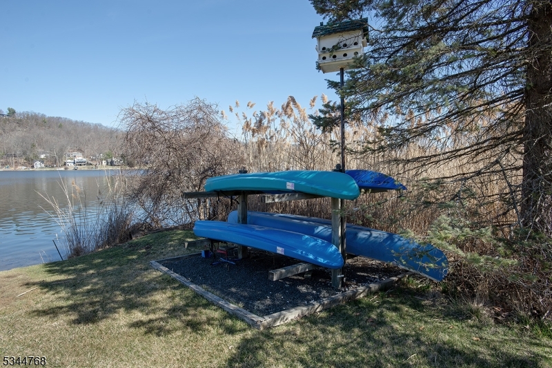 5 Marine Terrace Sparta, NJ 07871 - Photo 44 of 48 a view of a small yard with wooden fence