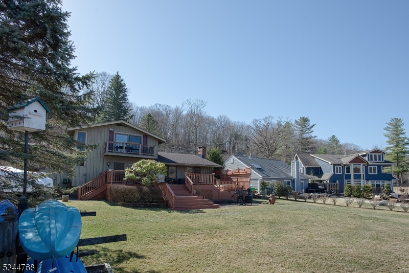 5 Marine Terrace Sparta, NJ 07871 - Photo 45 of 48 a view of a big house with a big yard and large trees