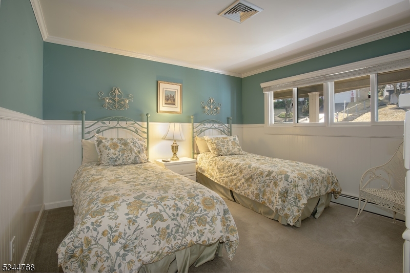 5 Marine Terrace Sparta, NJ 07871 - Photo 9 of 48 a bedroom with two beds and a window