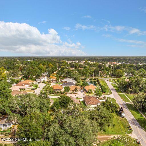 2950 Lakeside Villa Road Orange Park, FL 32073 - Photo 1 of 44 an aerial view of residential houses with outdoor space