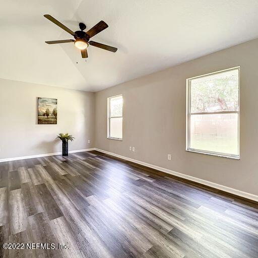 2950 Lakeside Villa Road Orange Park, FL 32073 - Photo 22 of 44 a view of empty room with wooden floor and fan