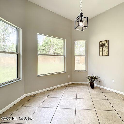 2950 Lakeside Villa Road Orange Park, FL 32073 - Photo 27 of 44 a view of an empty room with a window