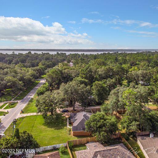 2950 Lakeside Villa Road Orange Park, FL 32073 - Photo 3 of 44 an aerial view of residential houses with outdoor space and trees