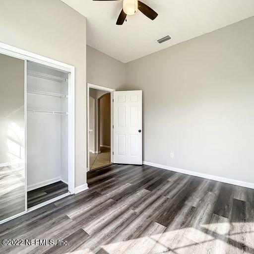 2950 Lakeside Villa Road Orange Park, FL 32073 - Photo 35 of 44 an empty room with a empty space and windows