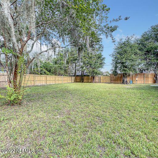 2950 Lakeside Villa Road Orange Park, FL 32073 - Photo 5 of 44 a view of outdoor space with deck and trees