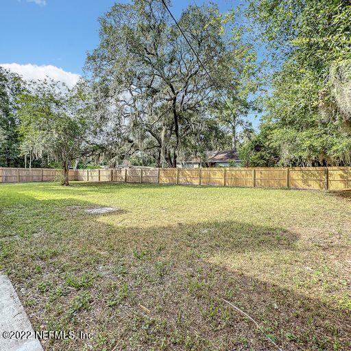 2950 Lakeside Villa Road Orange Park, FL 32073 - Photo 8 of 44 a view of a field with an trees