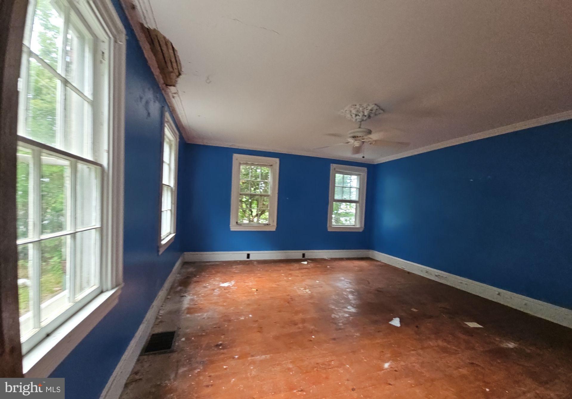 1223 Front Street Mauricetown, NJ 08329 - Photo 14 of 17 an empty room with windows and entrance