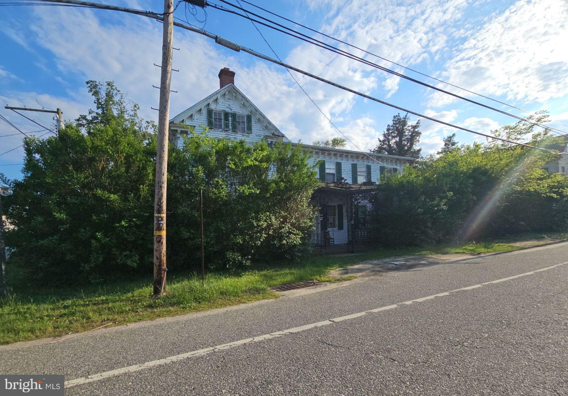 1223 Front Street Mauricetown, NJ 08329 - Photo 2 of 17 a view of a yard in front of a house