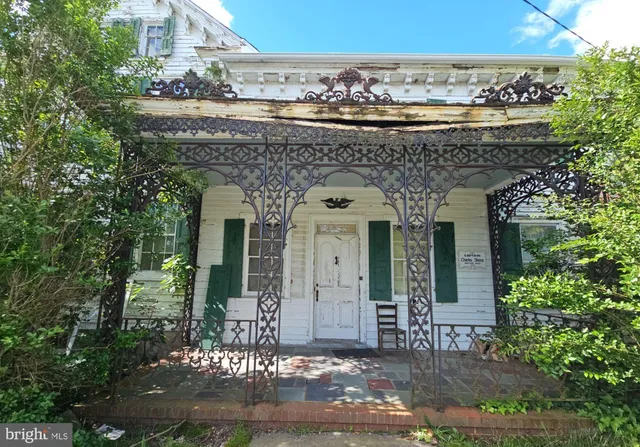 front view of a house with a small yard