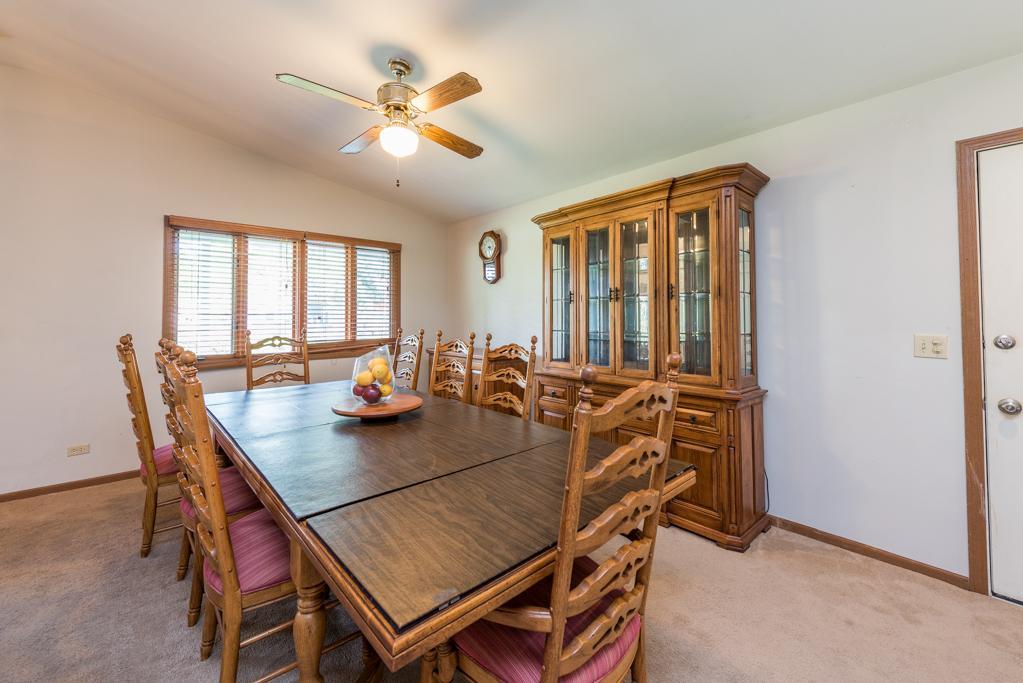 1702 Hebron Avenue Zion, IL 60099 - Photo 11 of 28 a view of a dining room and livingroom with furniture