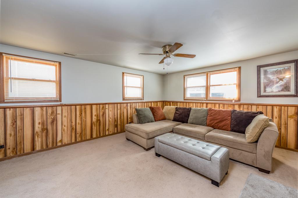 1702 Hebron Avenue Zion, IL 60099 - Photo 16 of 28 a living room with furniture and windows