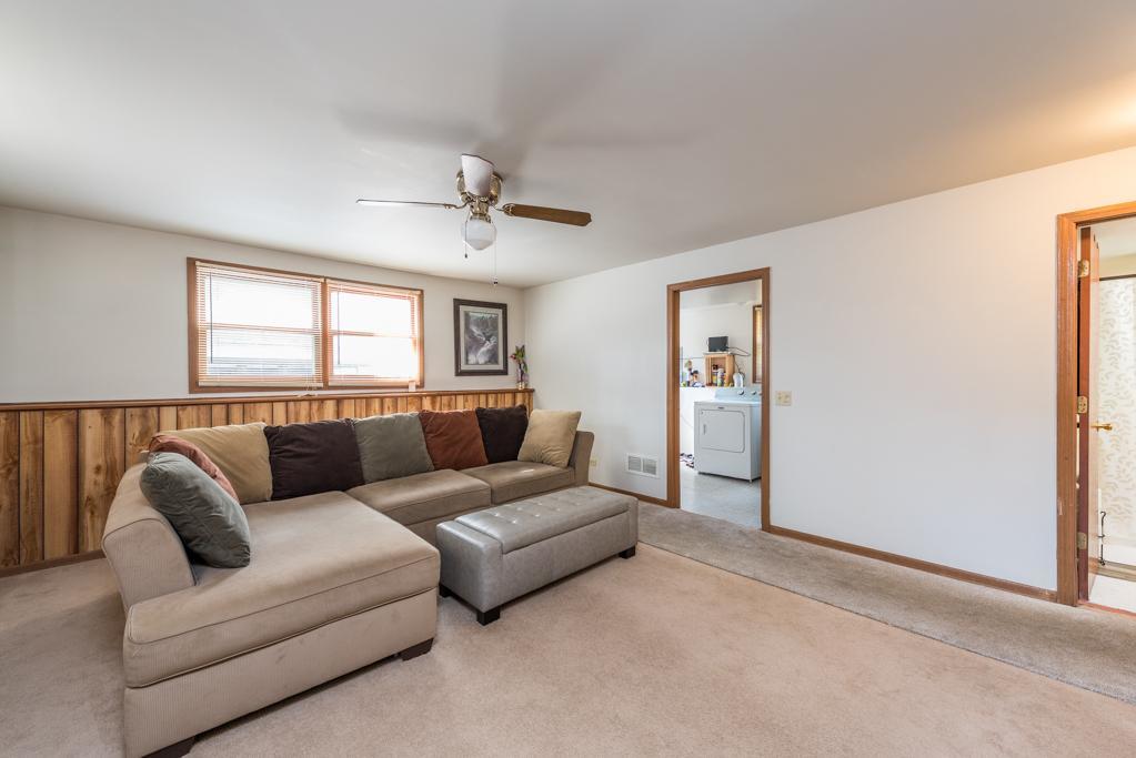 1702 Hebron Avenue Zion, IL 60099 - Photo 19 of 28 a living room with furniture and a large window