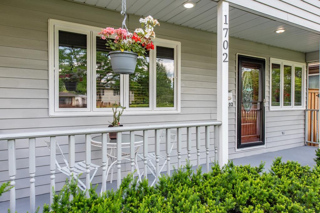 1702 Hebron Avenue Zion, IL 60099 - Photo 4 of 28 a front view of a house with an outdoor space
