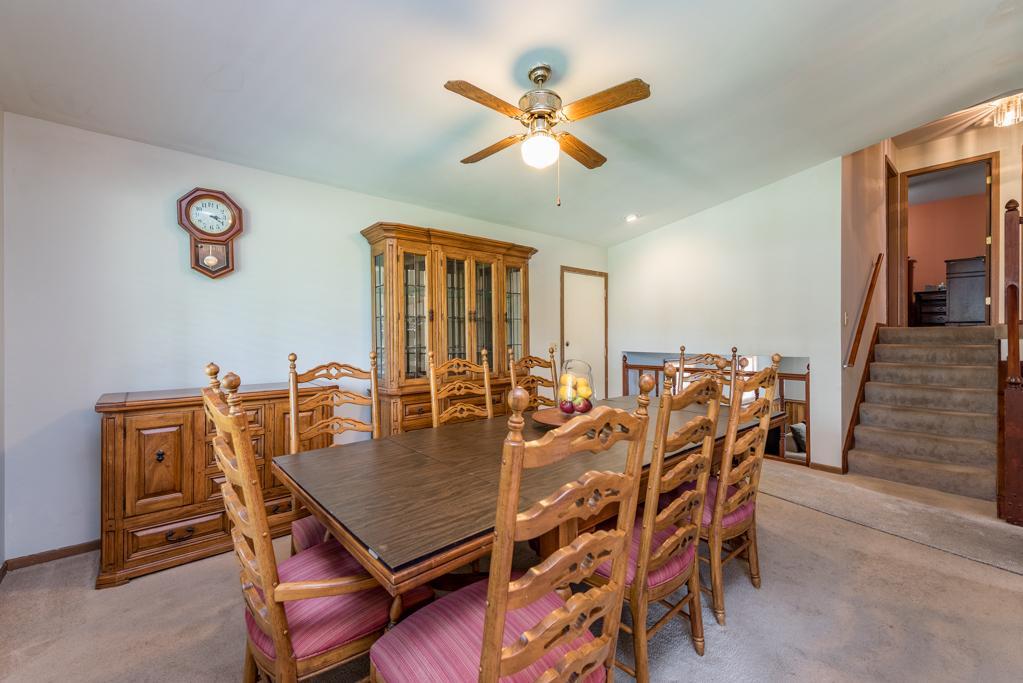 1702 Hebron Avenue Zion, IL 60099 - Photo 10 of 28 a view of a dining room and livingroom with furniture