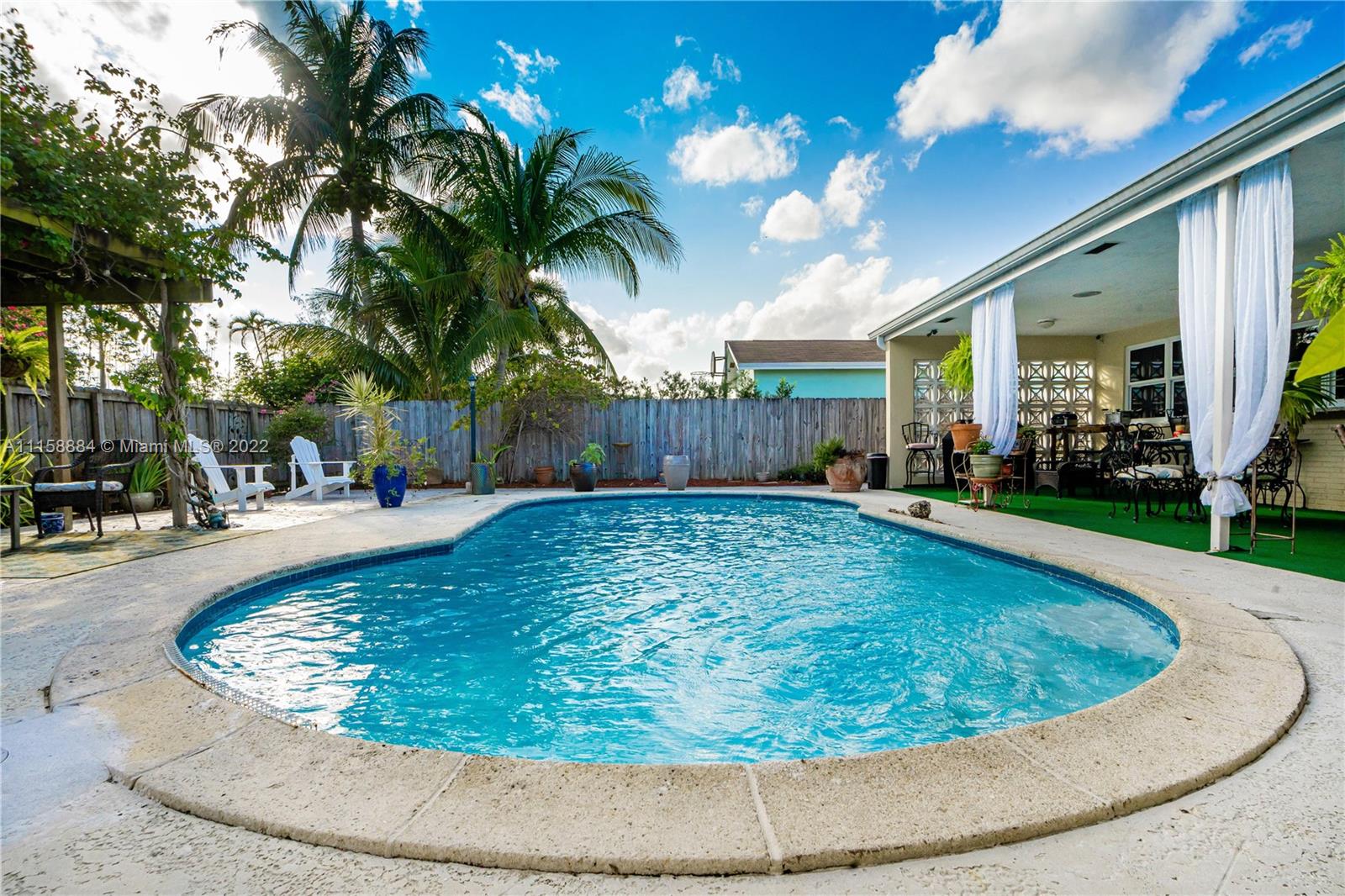 5012 Hayes Street Hollywood, FL 33021 - Photo 29 of 36 a view of a backyard