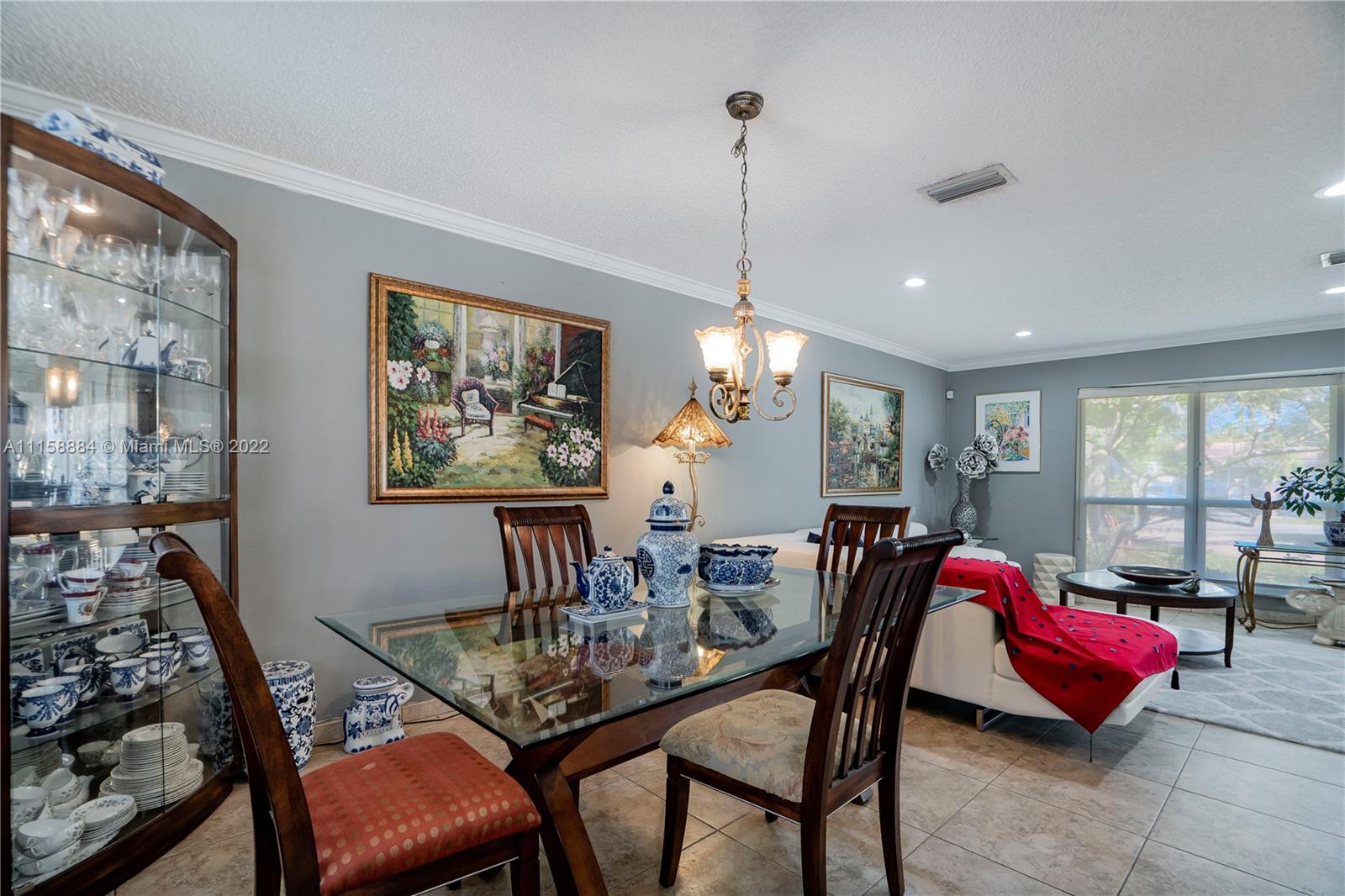 5012 Hayes Street Hollywood, FL 33021 - Photo 7 of 36 a view of a dining room with furniture window and outside view