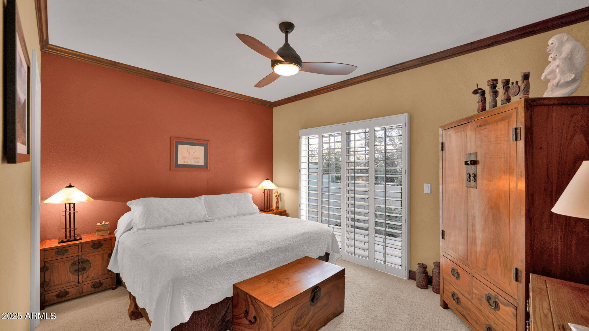 7710 East Gainey Ranch Road, Unit 113 Scottsdale, AZ 85258 - Photo 13 of 33 a bedroom with a bed and a window