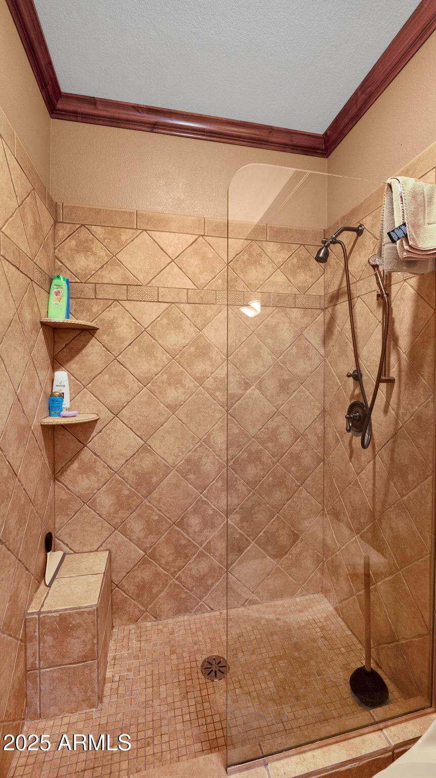 7710 East Gainey Ranch Road, Unit 113 Scottsdale, AZ 85258 - Photo 15 of 33 a bathroom with a shower