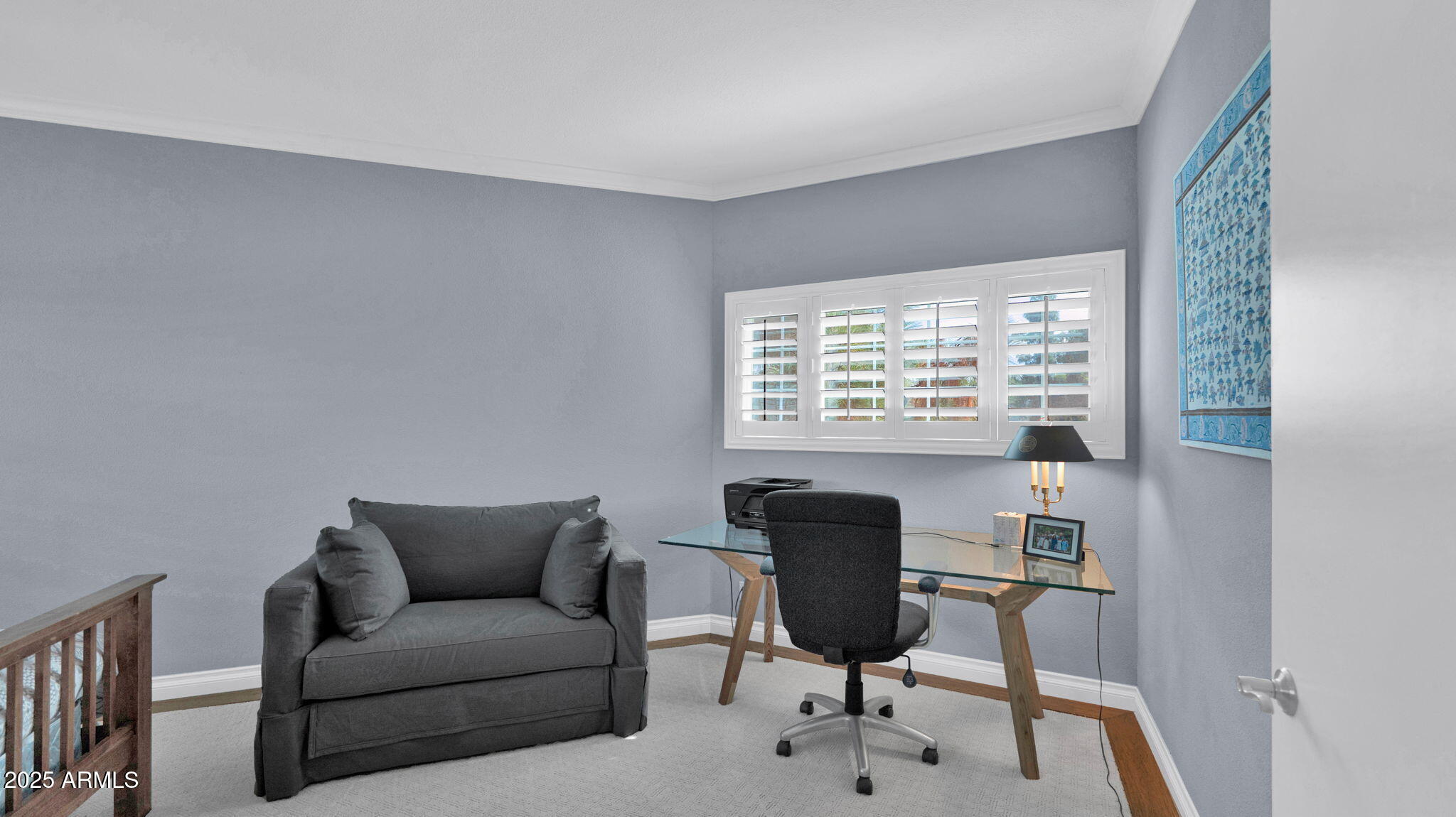 7710 East Gainey Ranch Road, Unit 113 Scottsdale, AZ 85258 - Photo 21 of 33 a living room with furniture and a window