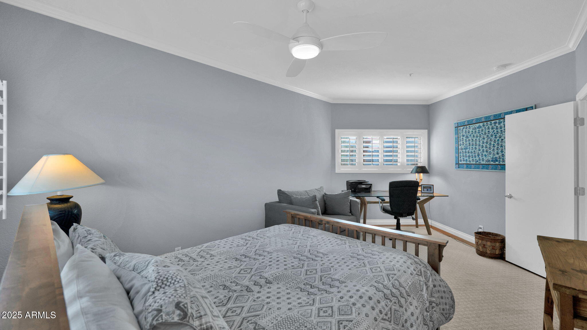 7710 East Gainey Ranch Road, Unit 113 Scottsdale, AZ 85258 - Photo 23 of 33 a bedroom with bed and window