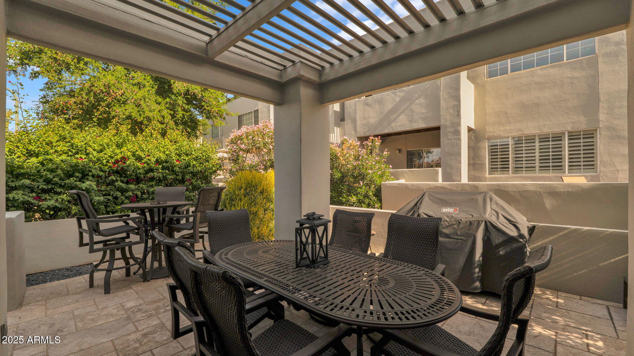 7710 East Gainey Ranch Road, Unit 113 Scottsdale, AZ 85258 - Photo 24 of 33 a view of a dining room with furniture window and outside view