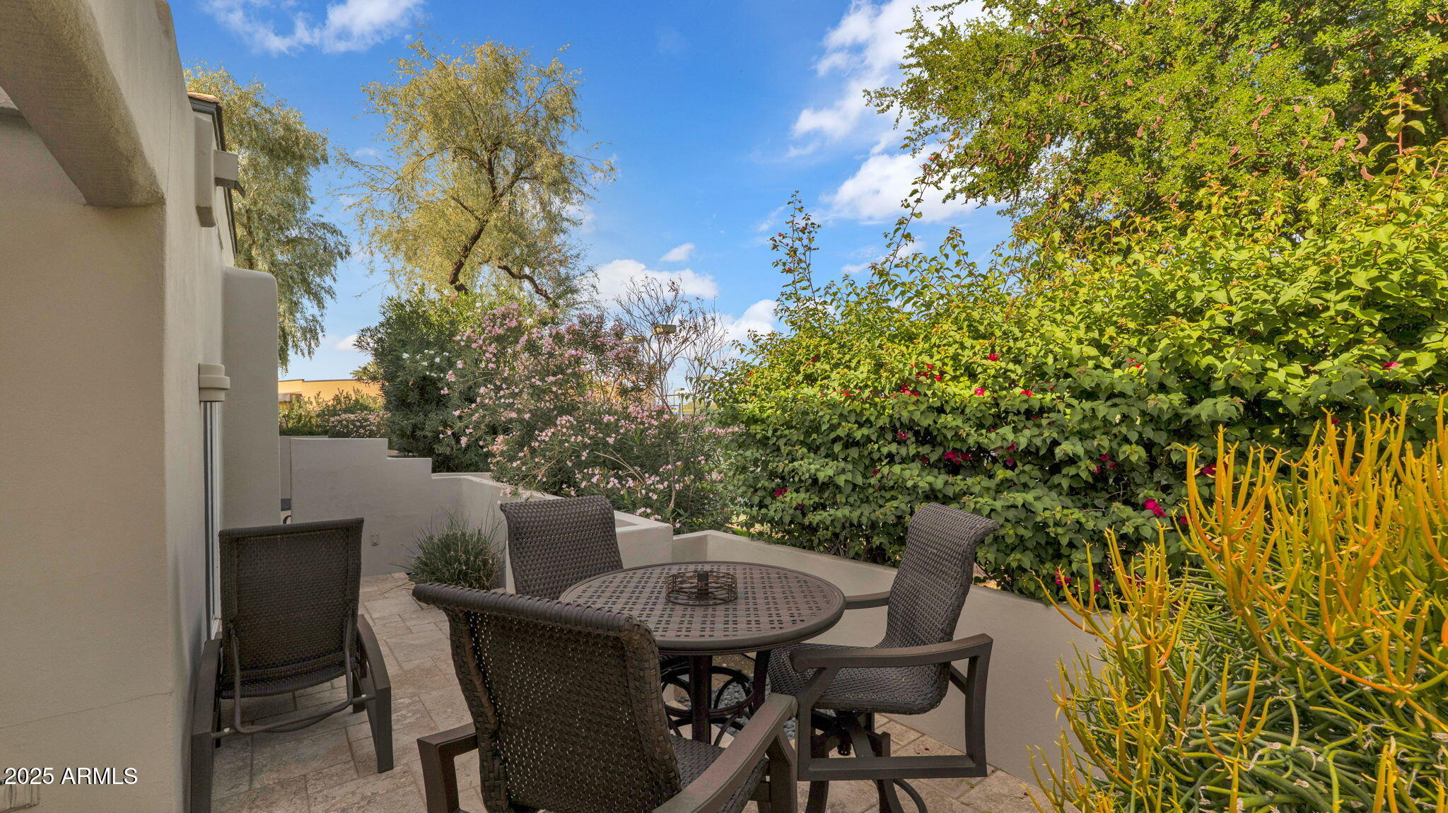 7710 East Gainey Ranch Road, Unit 113 Scottsdale, AZ 85258 - Photo 26 of 33 a view of a outdoor seating area