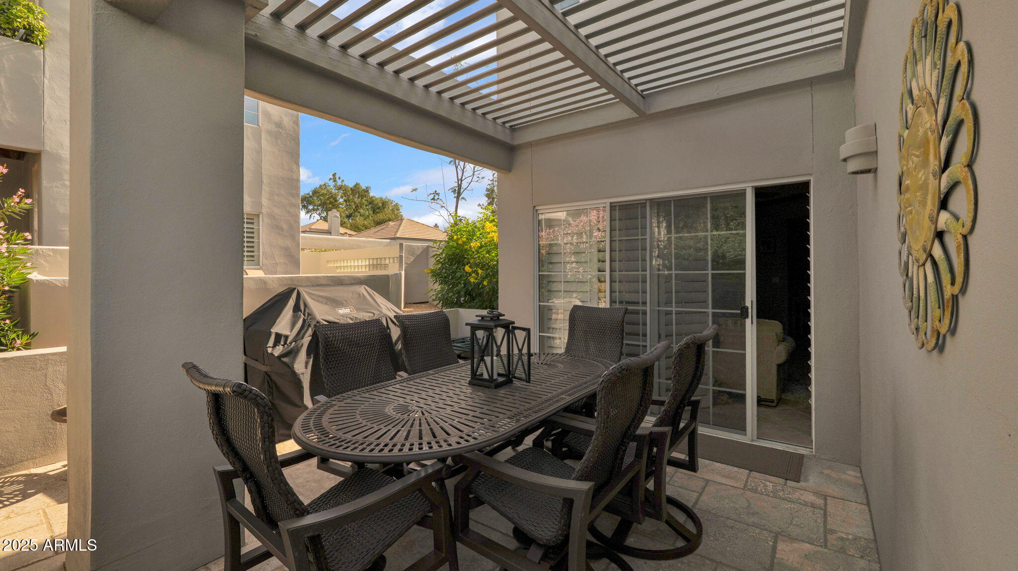 7710 East Gainey Ranch Road, Unit 113 Scottsdale, AZ 85258 - Photo 28 of 33 a view of a dining room with furniture window and outside view